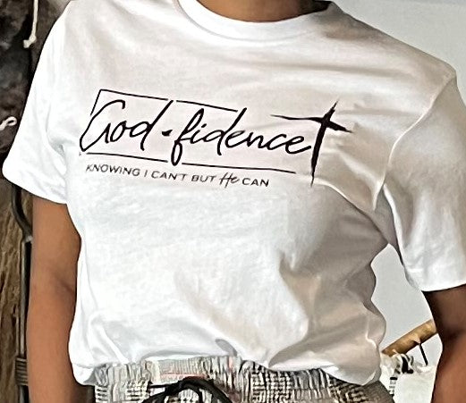 Closeup of woman wearing graphic tee that reads "God-fidence Knowing I can't but He can"